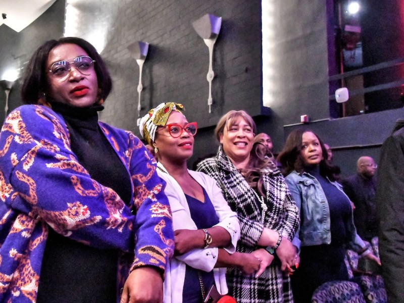 **FILE** Women link arms at a February 2025 Howard University event. Pan-African Women’s Day (PAWD) works to remind women across the diaspora of the need for global solidarity to achieve liberation in the ongoing fight against colonialism. (Robert R. Roberts/The Washington Informer)