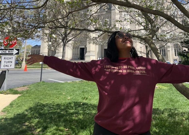 Washington Informer Managing Editor Micha Green enjoys a Sunday afternoon at the Washington National Cathedral on April 13. (Courtesy photo)