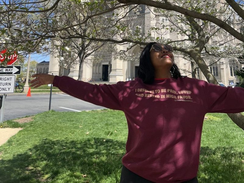 Washington Informer Managing Editor Micha Green enjoys a Sunday afternoon at the Washington National Cathedral on April 13. (Courtesy photo)