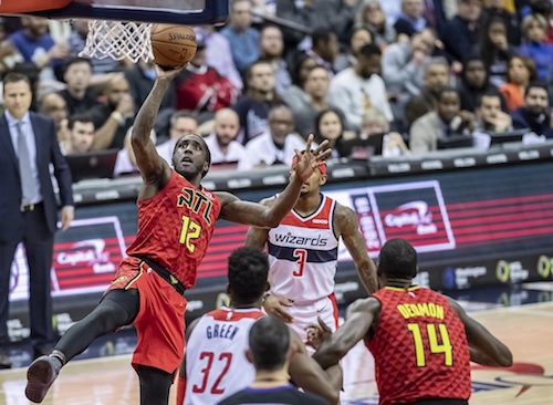 Atlanta Hawks forward Taurean Prince shoots a one-hand floater in the second half of the Hawks' 137-129 victory against the Washington Wizards at Capital One Arena in D.C. on Feb. 4. (Yusuf Abdullah/The Washington Informer)